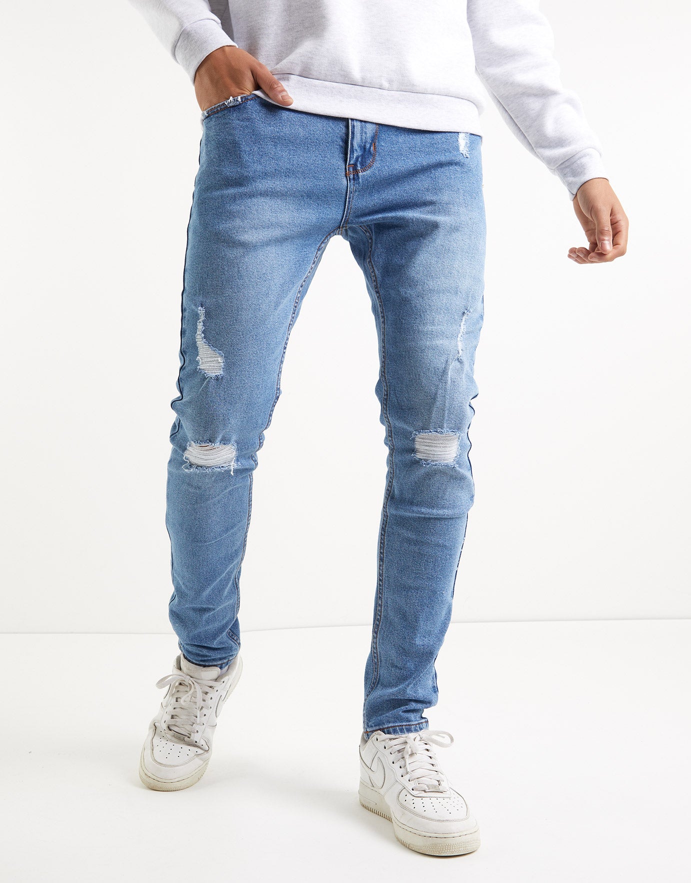 Ripped Skinny Jeans in Light Blue 