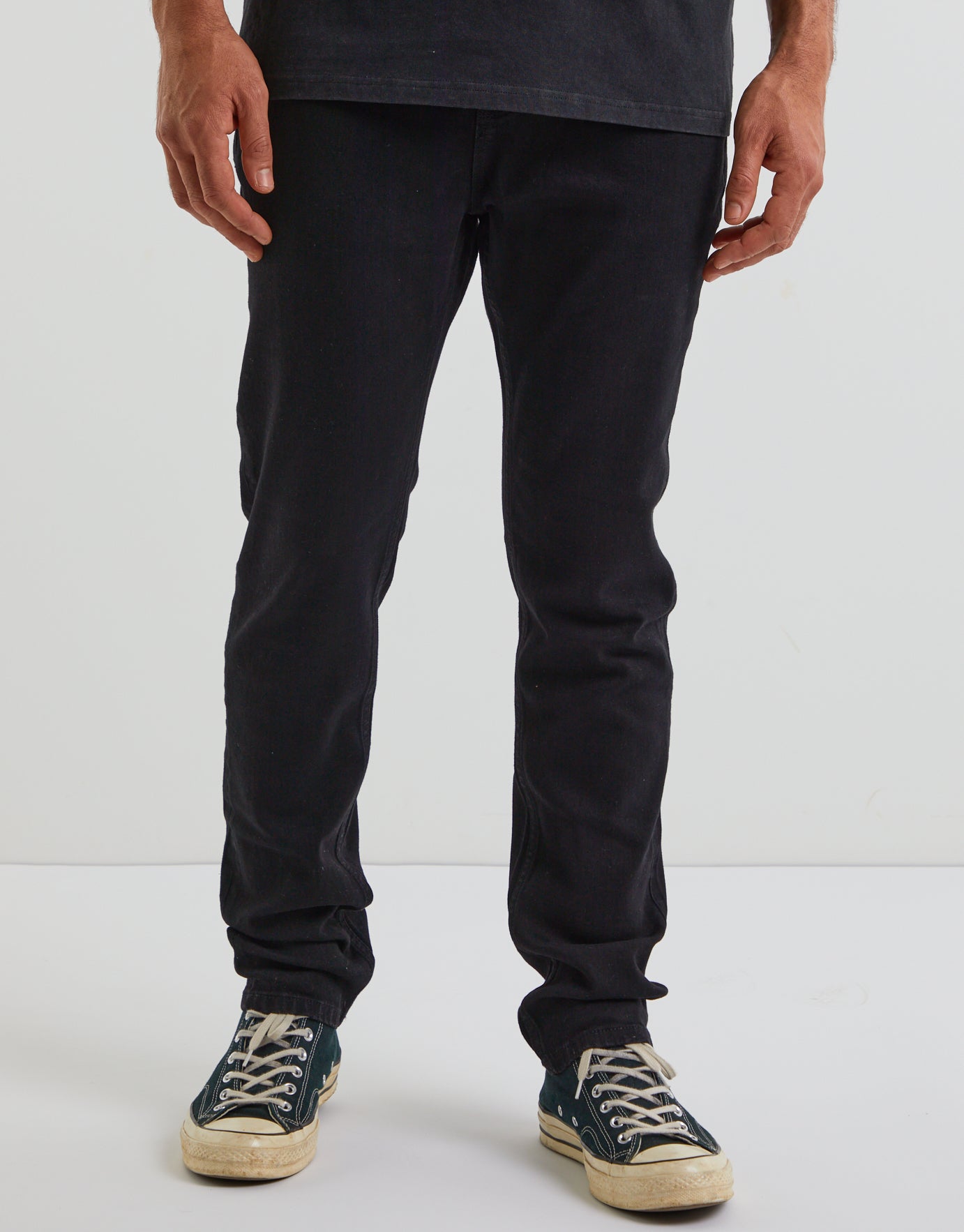 black tapered jeans