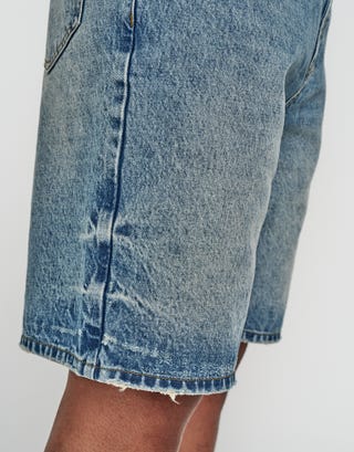Distressed Relaxed Fit Denim Shorts in Acid Wash Blue Detail
