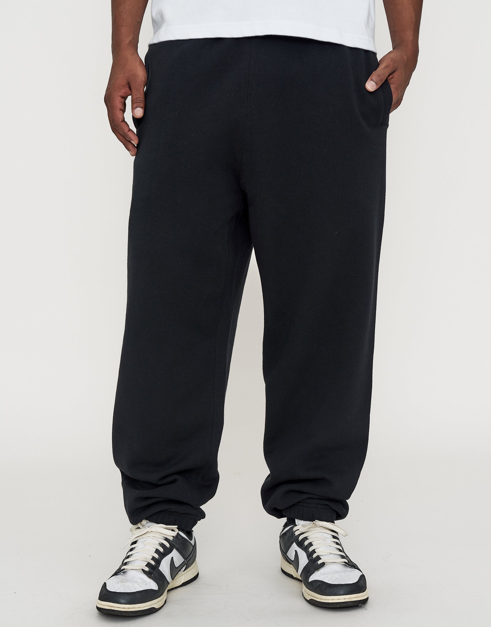 Baggy Leisure Club Cuffed Track Pants in Black | Hallensteins NZ