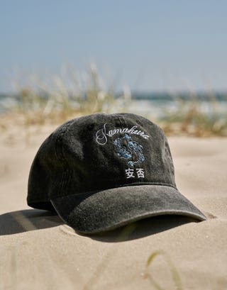 Dragon embroidered Cap in Washed Black Front