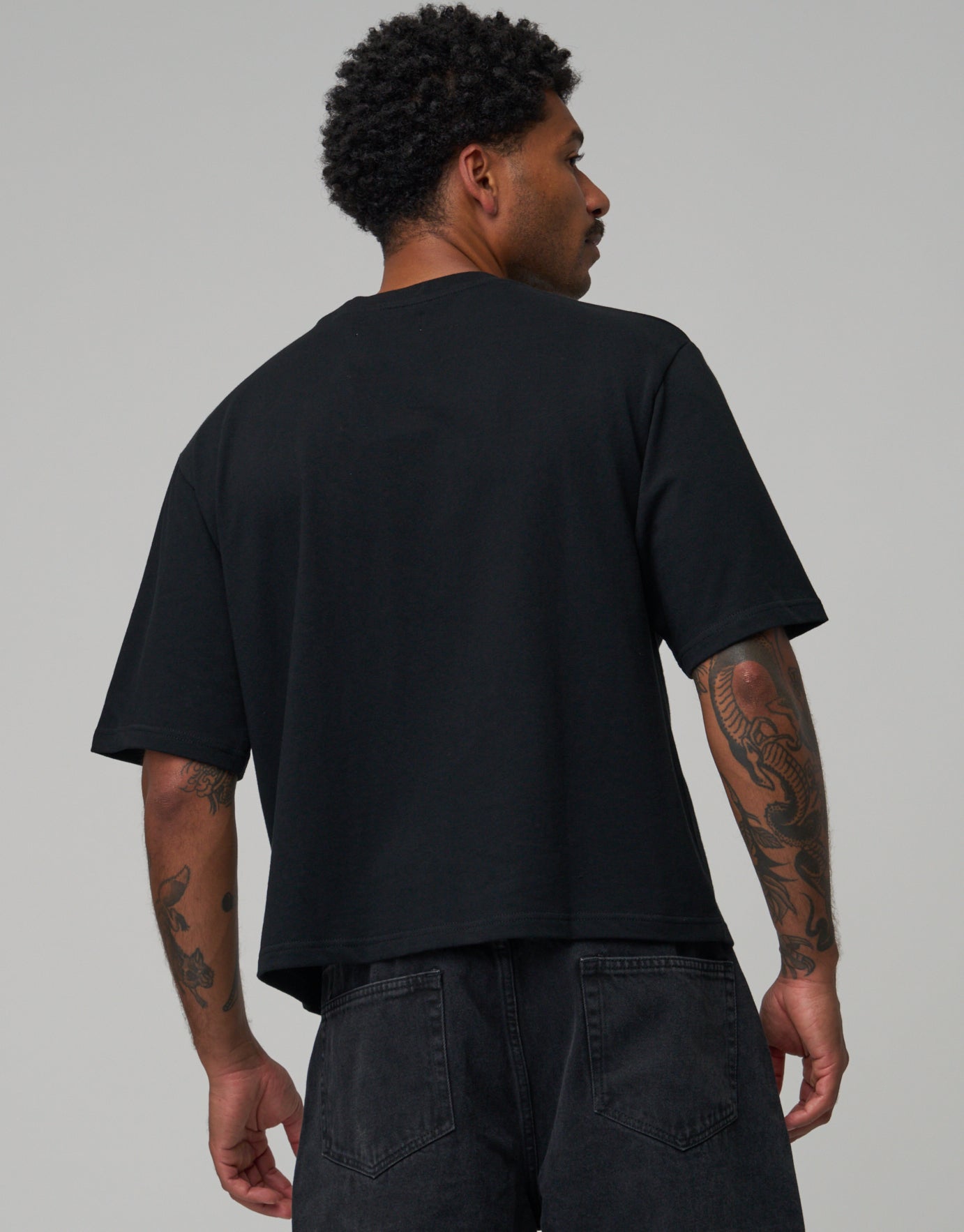 Cropped Relaxed Fit T Shirt in Black | Hallensteins NZ