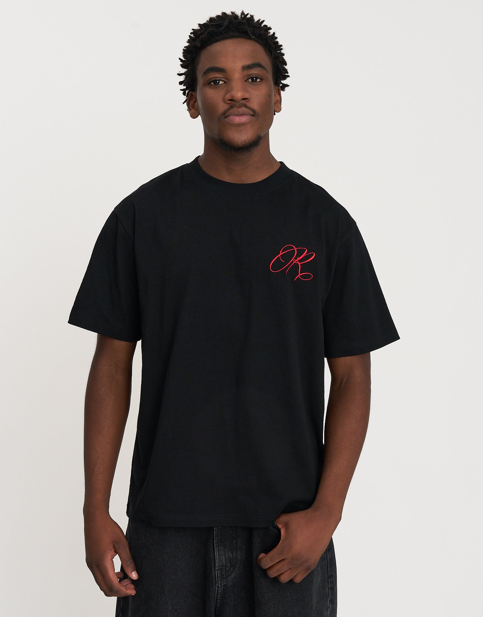 Redemption Relaxed Fit T Shirt in Black/red | Hallensteins NZ