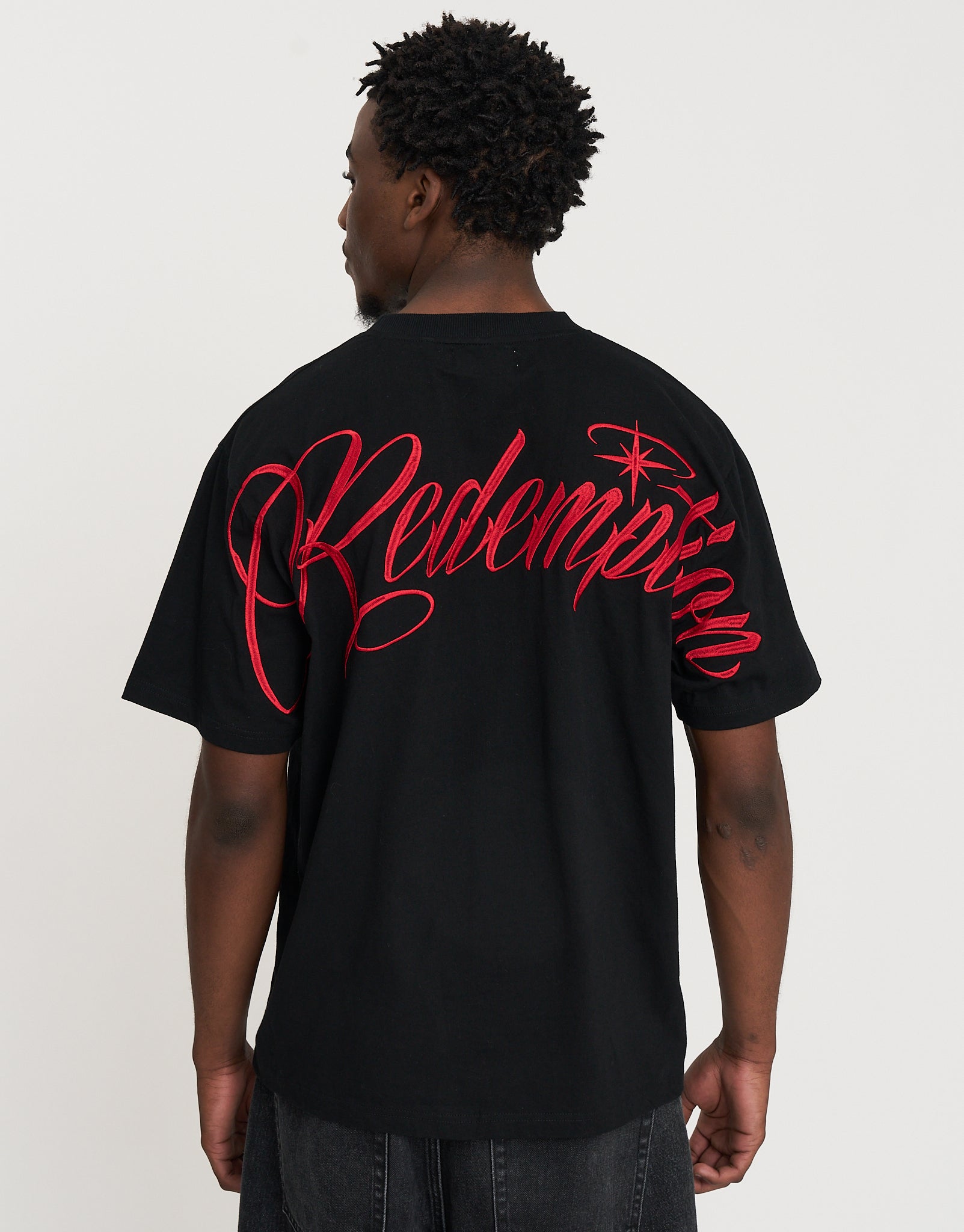 Redemption Relaxed Fit T Shirt in Black/red | Hallensteins NZ