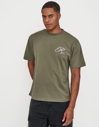 Redemption Relaxed Fit T Shirt in Cyprus Green Back