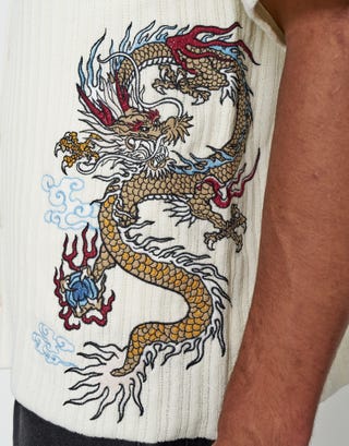 Sakura Knit Embroidered Short Sleeve Polo Shirt in Snow Detail