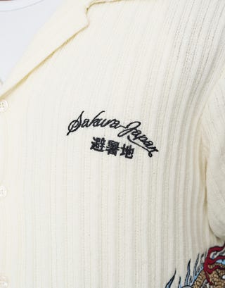 Sakura Knit Embroidered Short Sleeve Polo Shirt in Snow Detail2