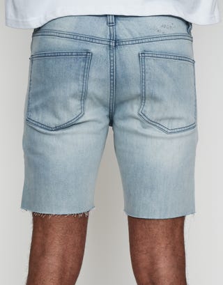Skinny Rip Denim Shorts in Snow Wash Back