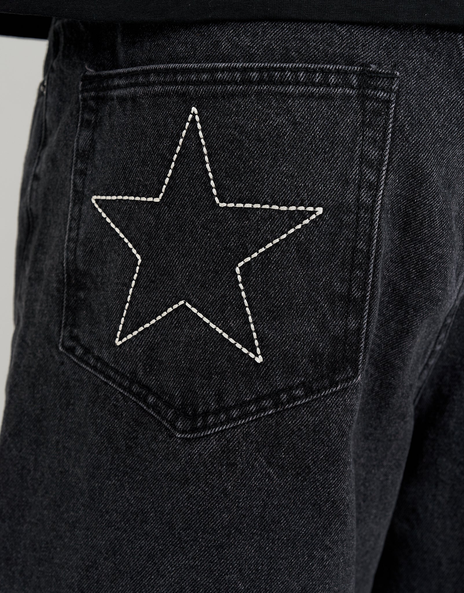 Stars Embroidered Baggy Fit Jorts in Washed Black | Hallensteins NZ
