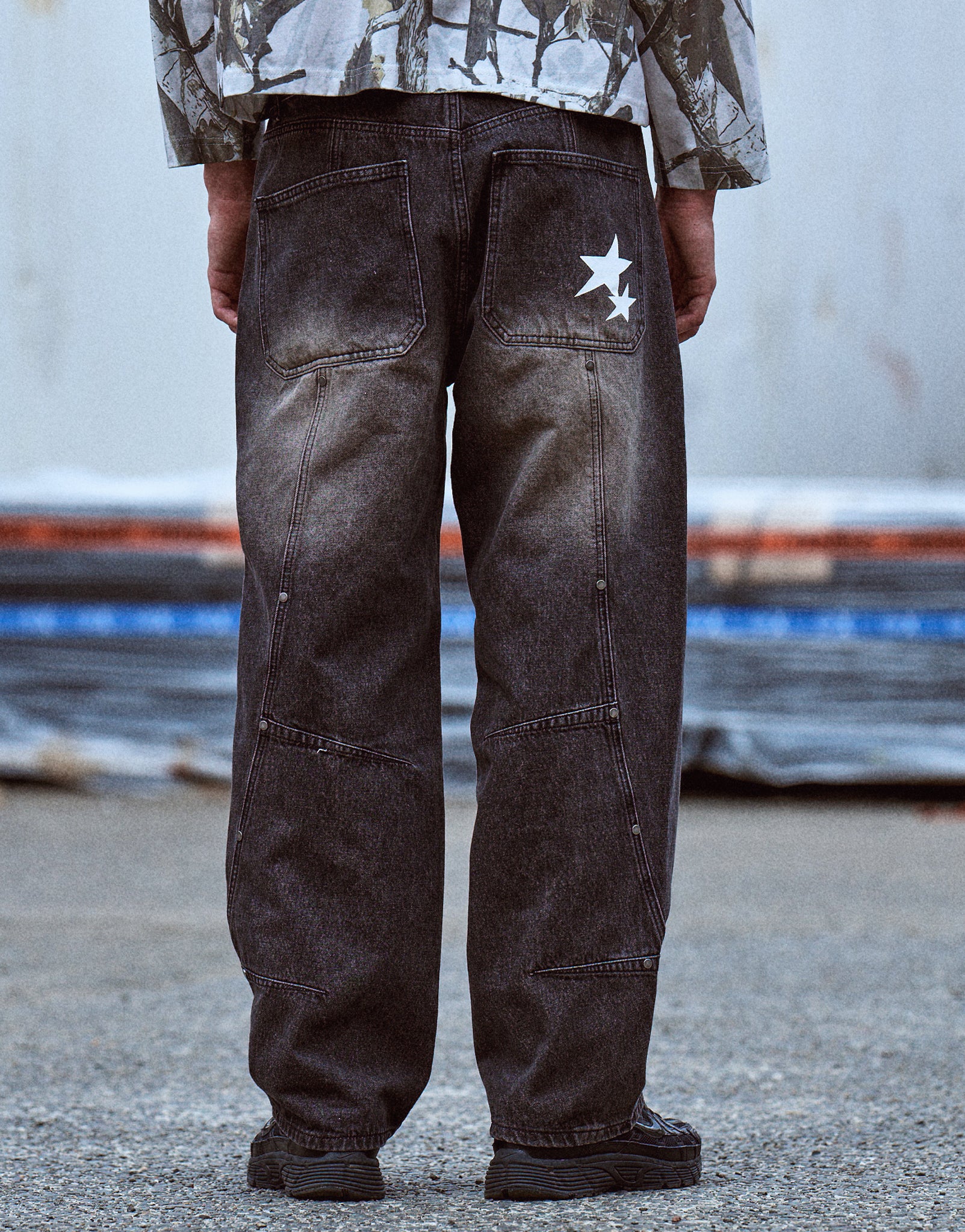 Static Supply Studded Baggy Fit Jeans in Washed Black