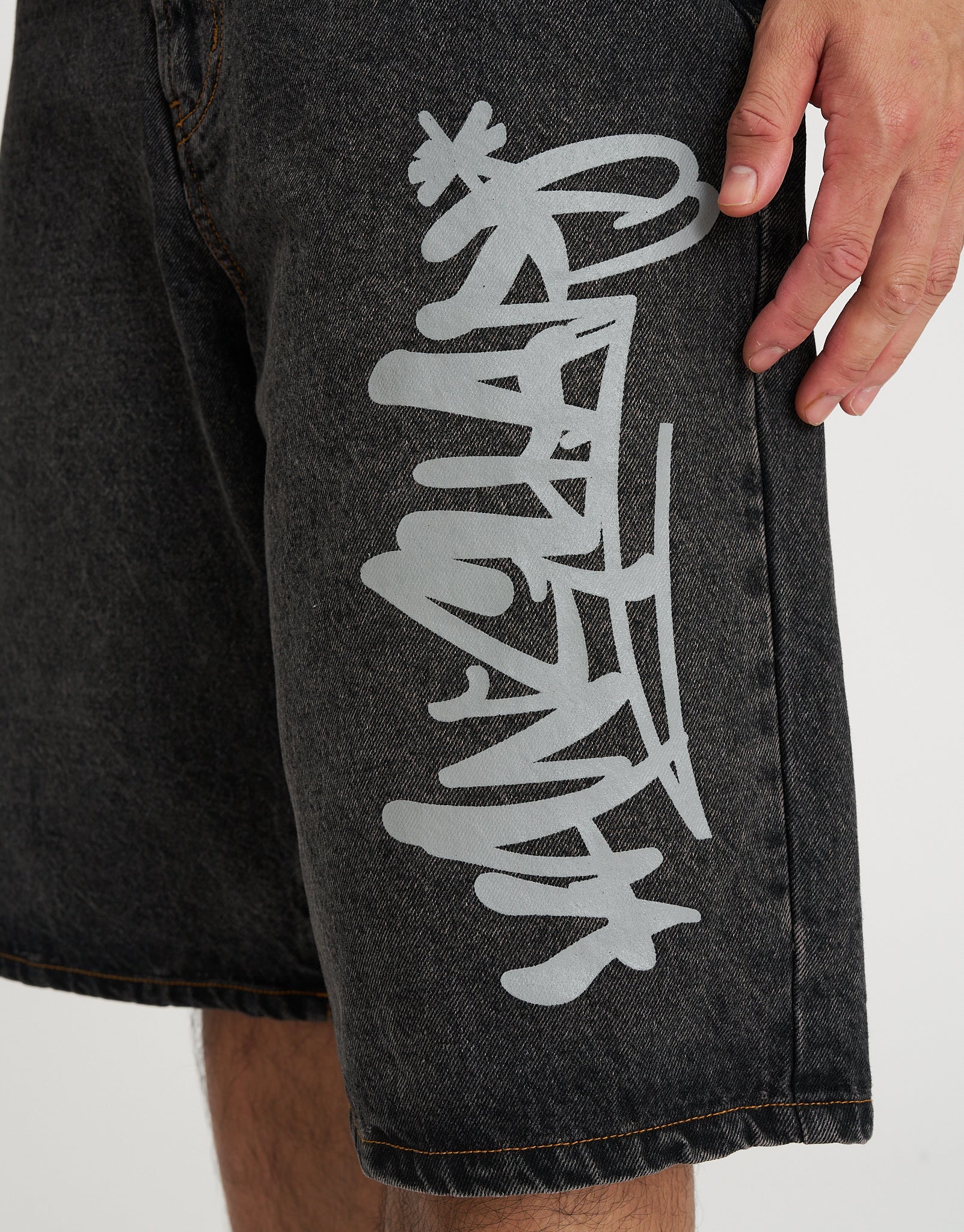 Vanguard Graffiti Baggy Fit Jorts in Acid Black | Hallensteins NZ