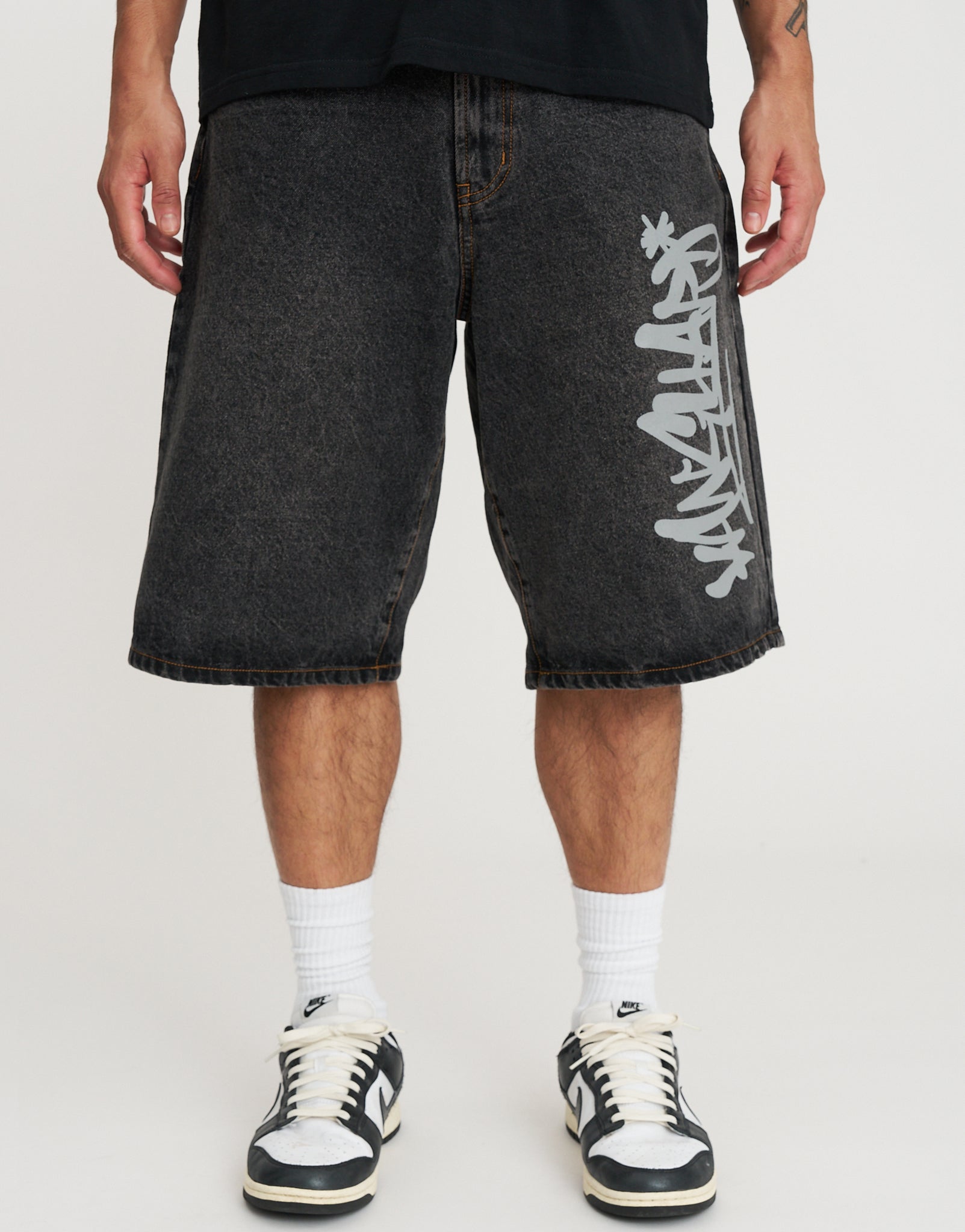 Vanguard Graffiti Baggy Fit Jorts in Acid Black | Hallensteins NZ
