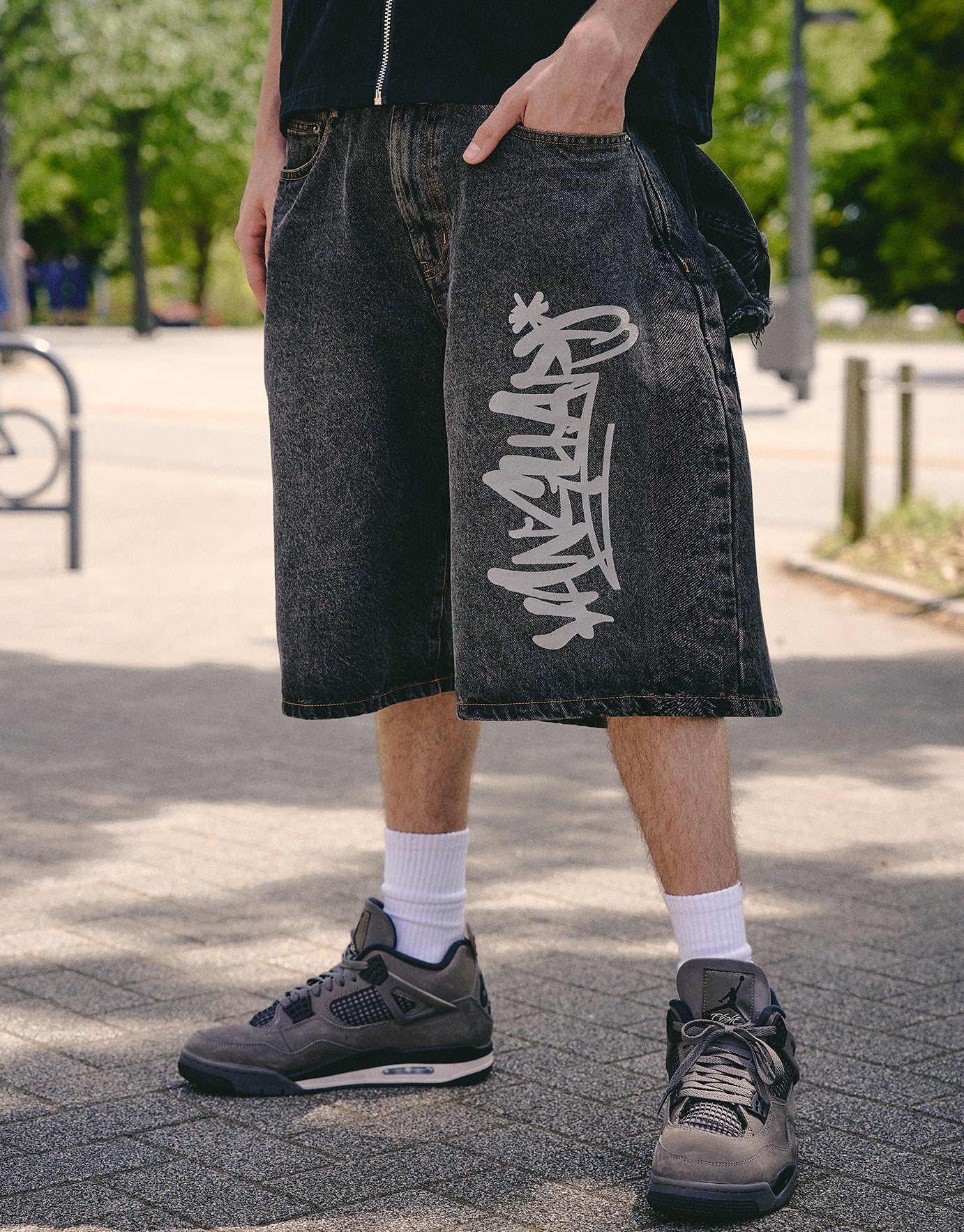 Vanguard Graffiti Baggy Fit Jorts in Acid Black | Hallensteins NZ