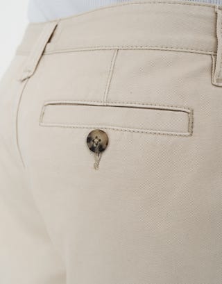 Relaxed Fit Pleated Shorts in Bone Detail3