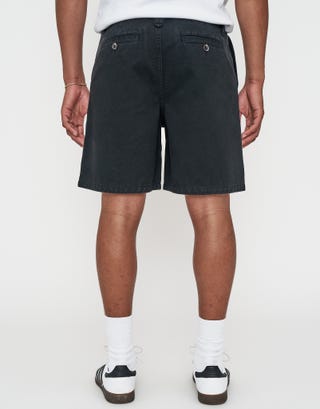 Relaxed Fit Pleated Shorts in Washed Black Back