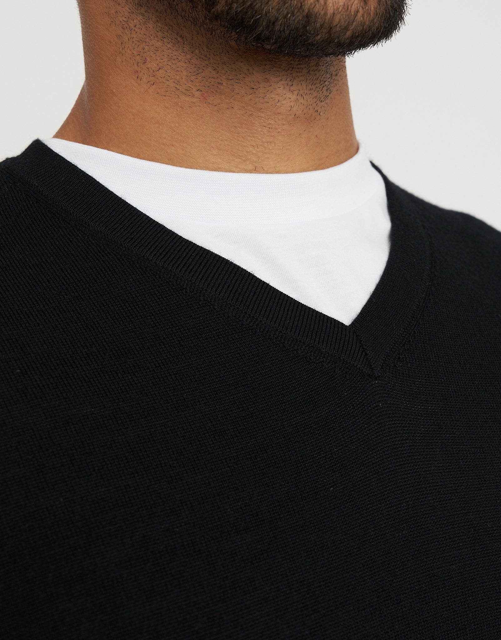 100% Merino V Neck Knit Jumper in Black | Hallensteins NZ
